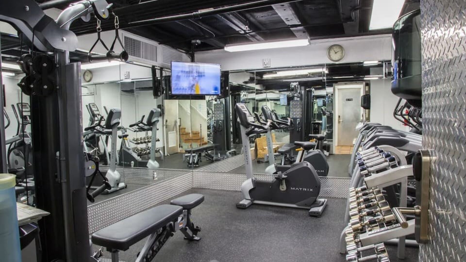 Well equipped fitness center at Circa 39 Hotel.