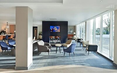 Lounge and coworking space at Hyatt Place London Heathrow Airport.