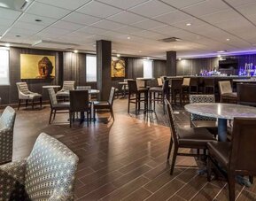 Dining area perfect for coworking at Best Western Premier NYC Gateway.