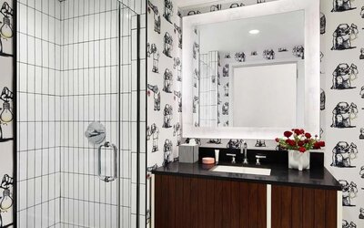 Private guest bathroom with shower at Graduate New York.