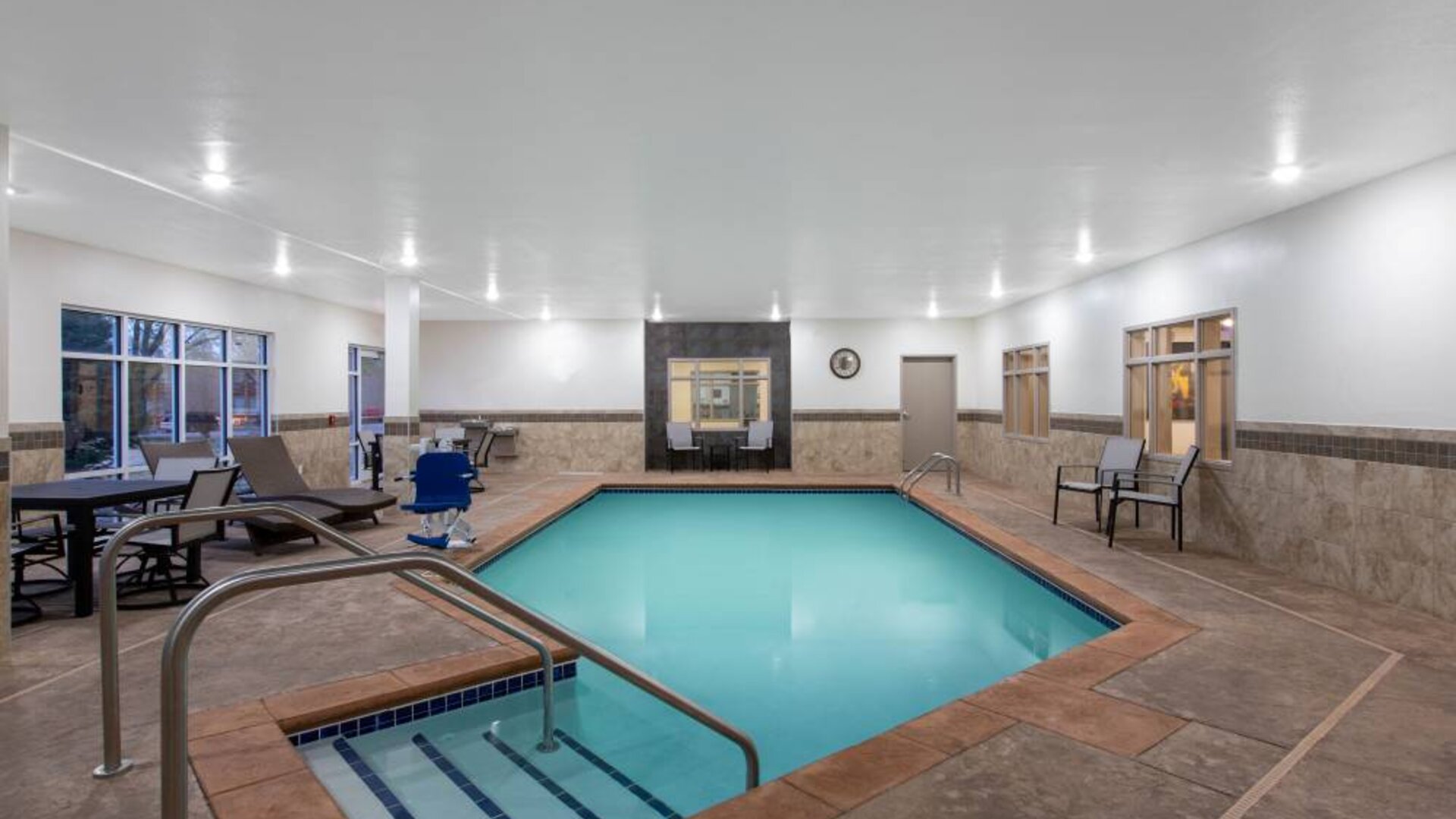Refreshing indoor pool at AmericInn By Wyndham Sioux Falls North.