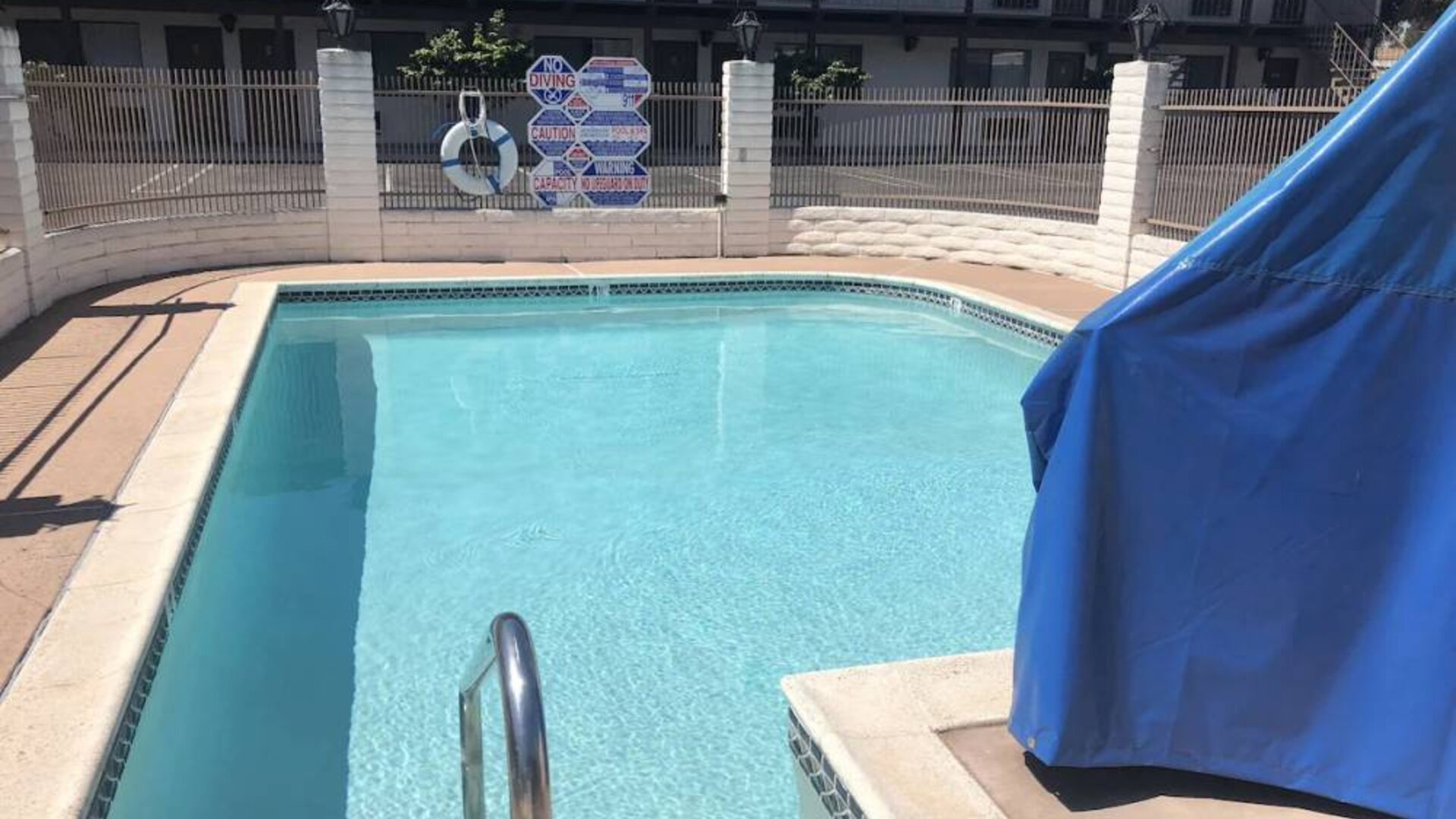 Refreshing outdoor pool at Cozy Inn.