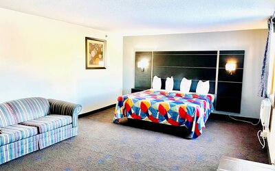 Spacious day use room with natural light at Coratel Inn & Suites By Jasper Northfield.