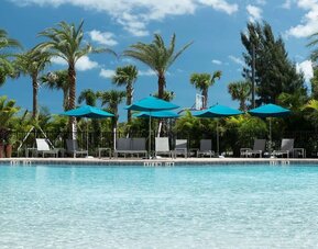 Stunning outdoor pool at Home2 Suites By Hilton Cape Canaveral Cruise Port.