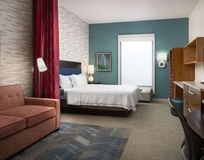 King bed with work desk at Home2 Suites By Hilton Charleston Airport/Convention Center.