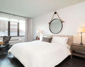 Spacious day room with business desk at Hilton Garden Inn New York/Tribeca.