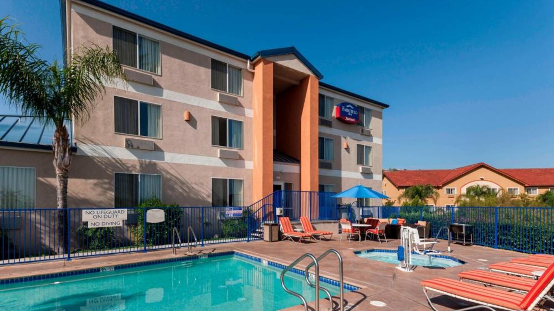Refreshing outdoor pool and hot tub at Fairfield Inn By Marriott Santa Clarita Valencia.
