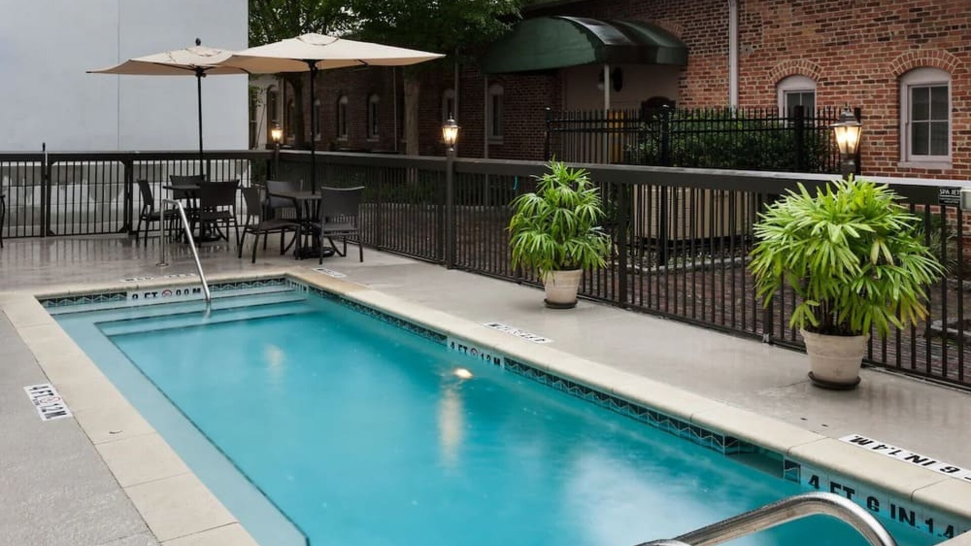 Stunning outdoor pool at Hampton Inn & Suites Gainesville-Downtown.