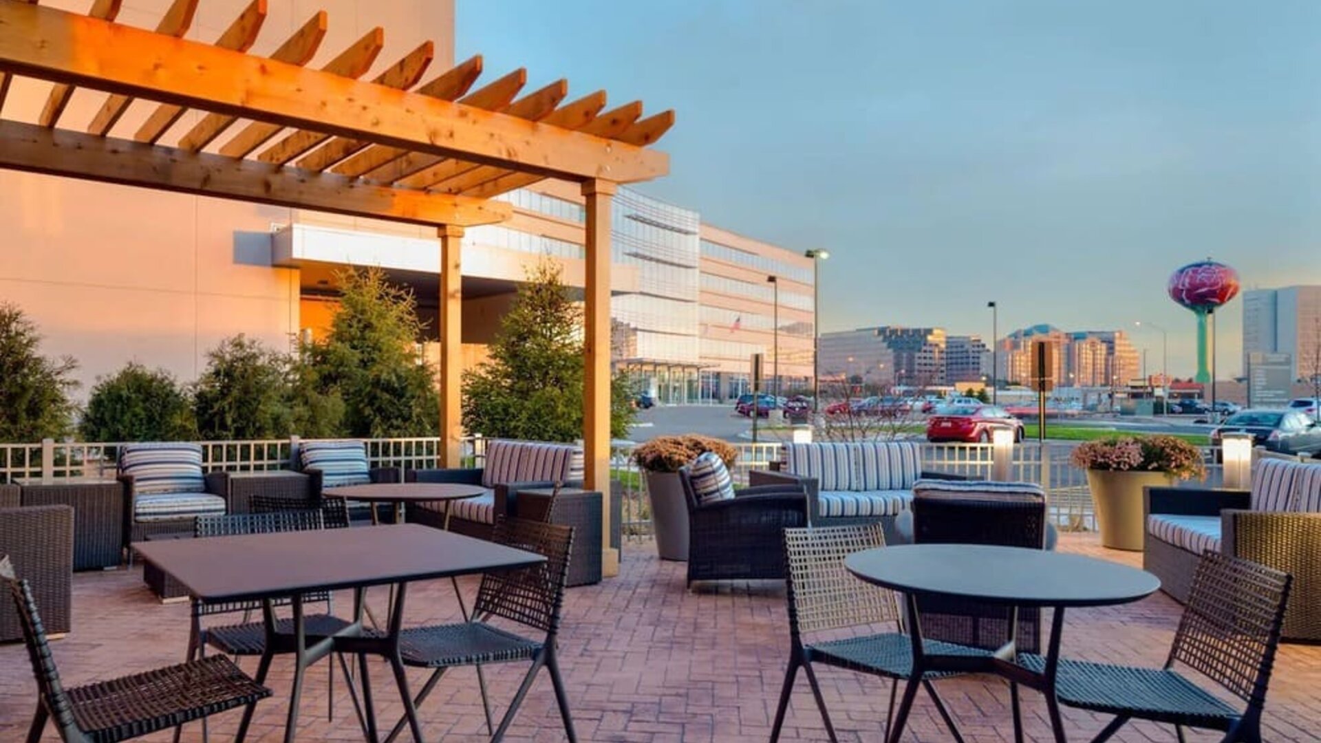 Lovely outdoor terrace and coworking space at Hampton Inn & Suites Rosemont Chicago O'Hare.