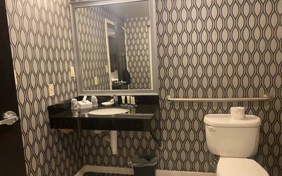 Guest bathroom with shower at Park Manor Hotel.