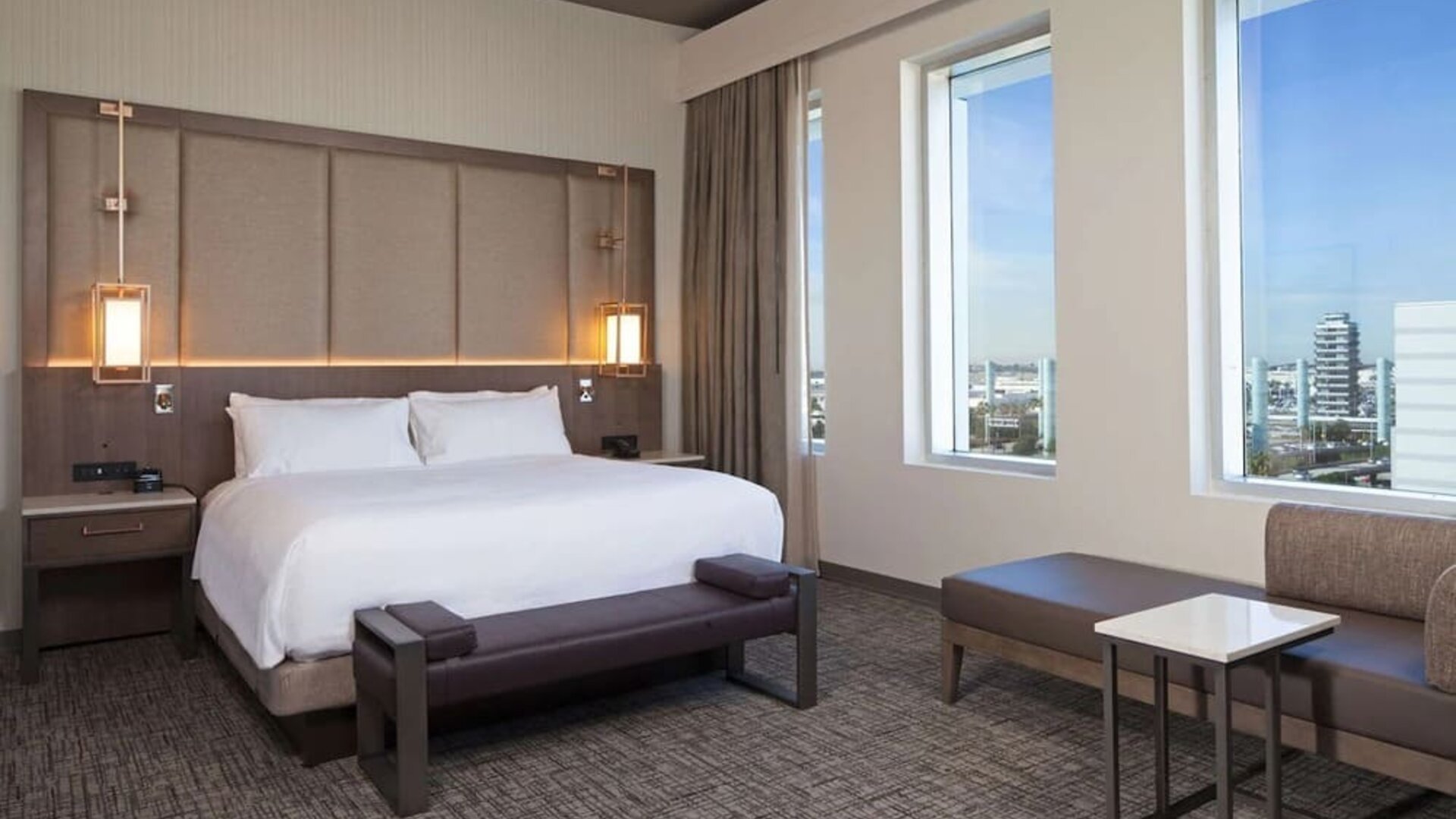Delux king with natural light at H Hotel Los Angeles, Curio Collection By Hilton.