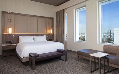Delux king with natural light at H Hotel Los Angeles, Curio Collection By Hilton.