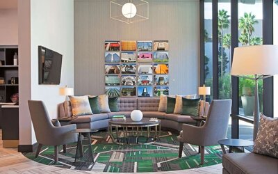 Lounge and coworking space at H Hotel Los Angeles, Curio Collection By Hilton.