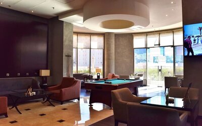 Lounge and coworking space at Millennium Central Doha.