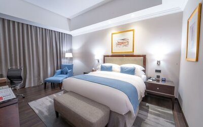 Delux king bed with work station at Millennium Hotel Doha.