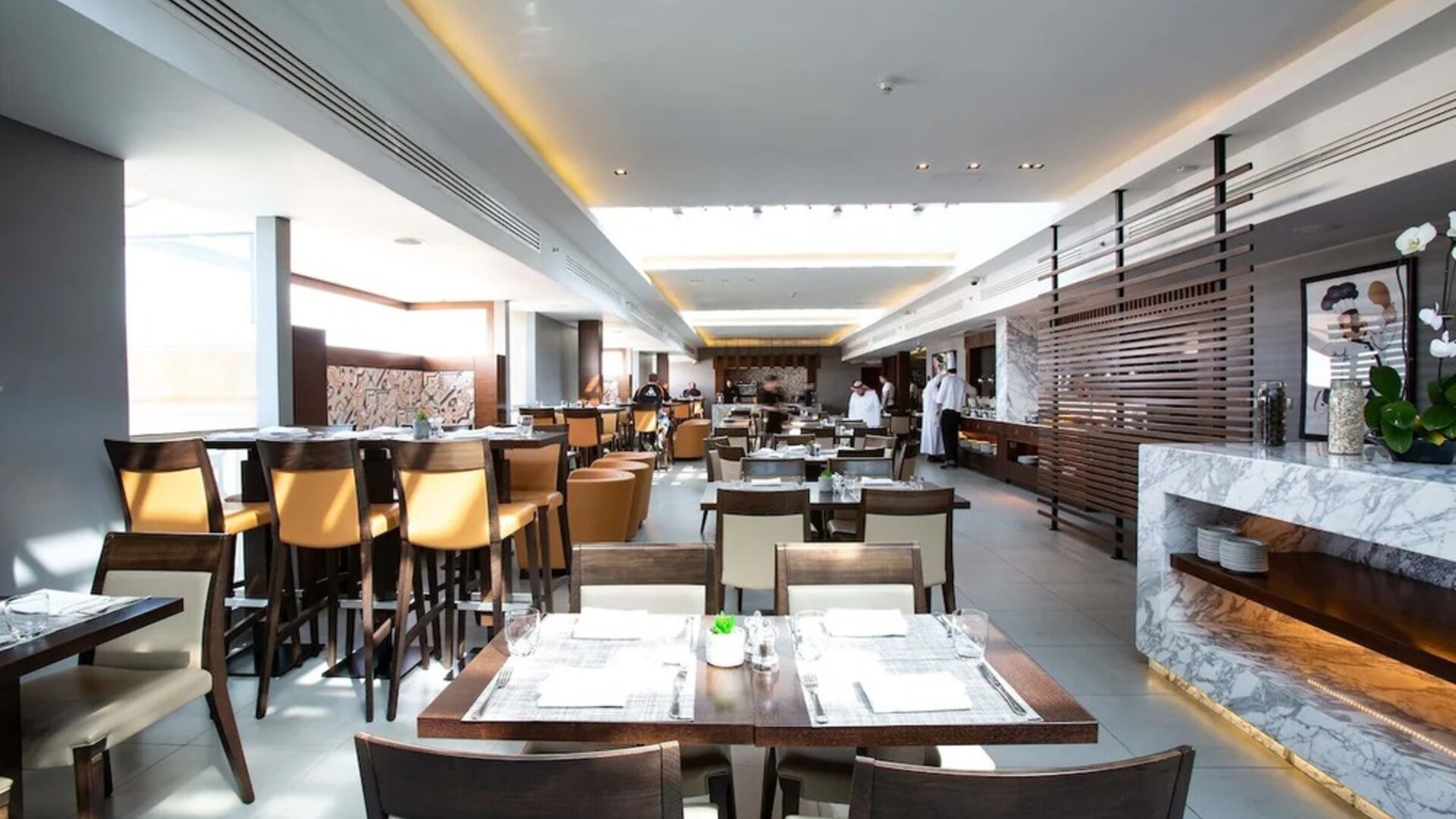 Dining and coworking space at Millennium Hotel Doha.