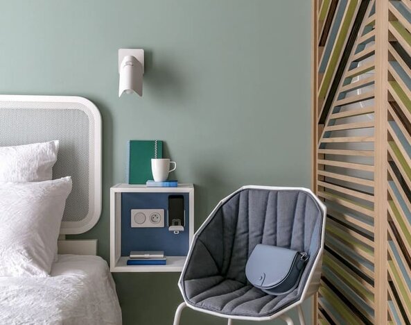 Day rooms with plush bedding at OKKO Hotels Nice Aéroport.