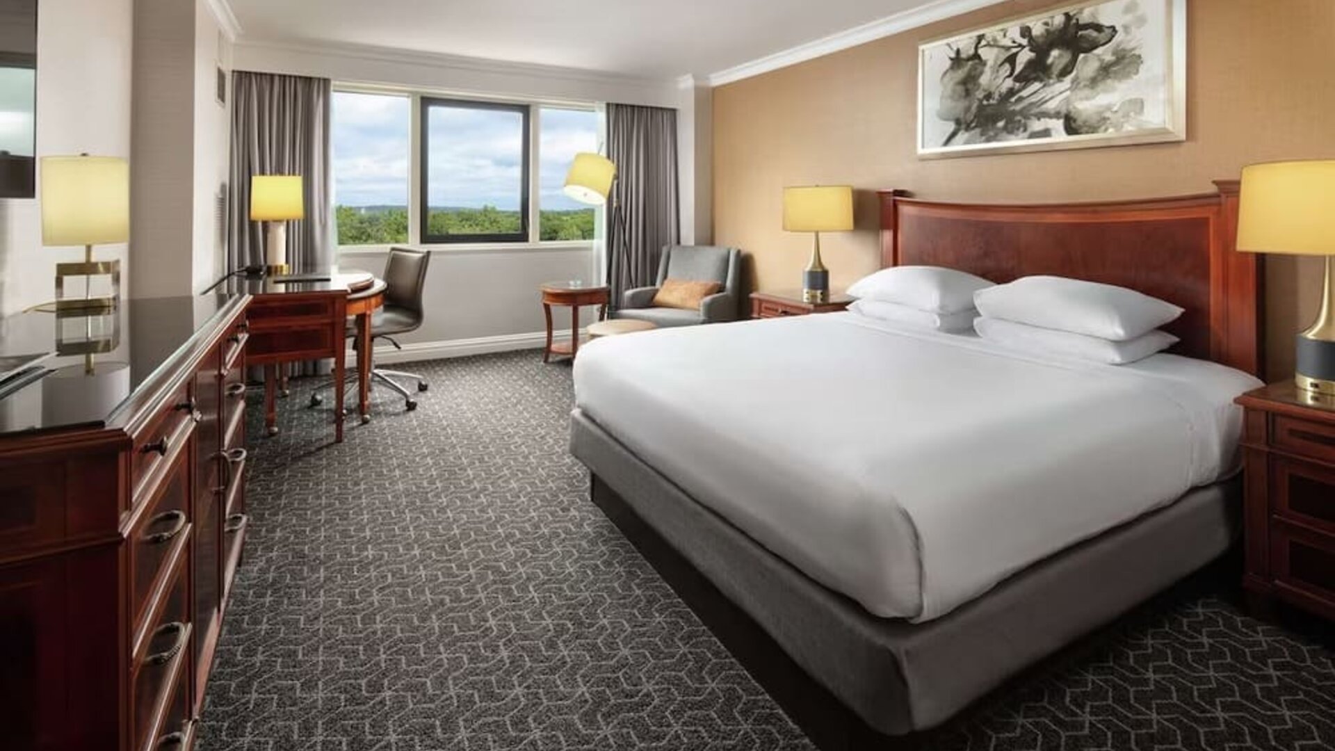 Spacious king room with TV and work station at Hilton Short Hills.