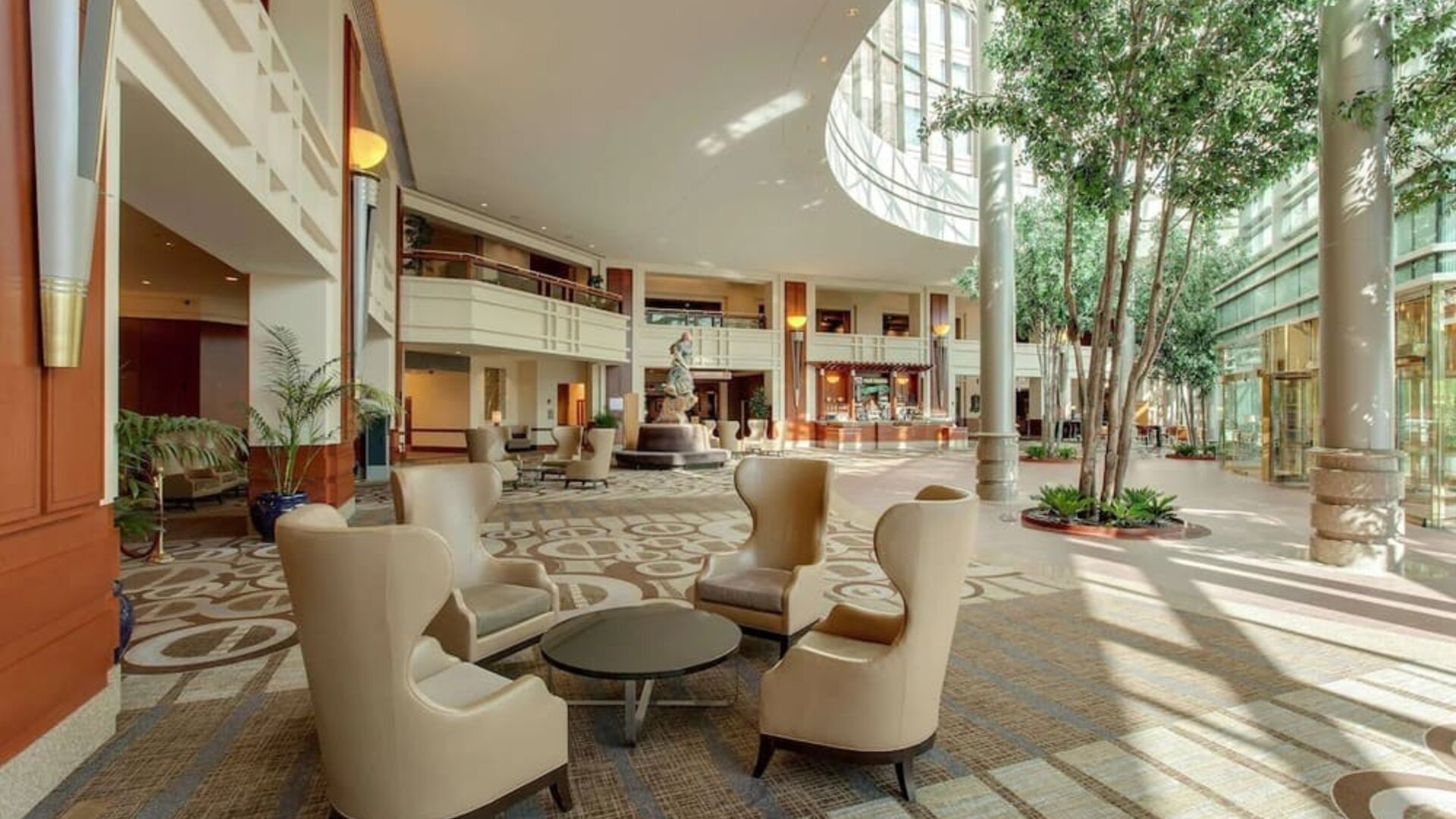 Lounge, lobby, and coworking space at Hilton Boston Logan Airport.