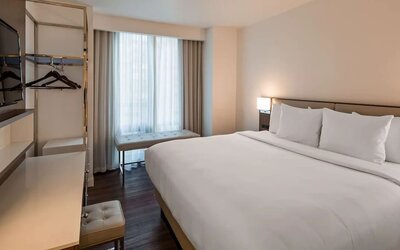 Romantic king room with work station at Best Western Premier Empire State Hotel.