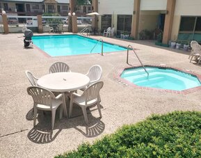 Refreshing outdoor pool at Coratel Inn & Suites By Jasper New Braunfels IH-35 EXT 189.
