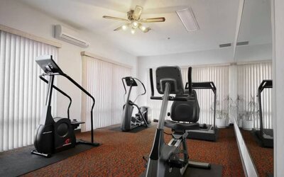 Fitness center available at Coratel Inn & Suites By Jasper New Braunfels IH-35 EXT 189.