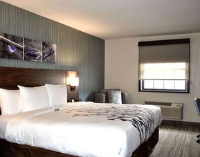 King bed with work space at Sleep Inn Oakbrook Terrace.