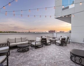 Seats in rooftop perfect for coworking at TownePlace Suites Nashville Midtown.