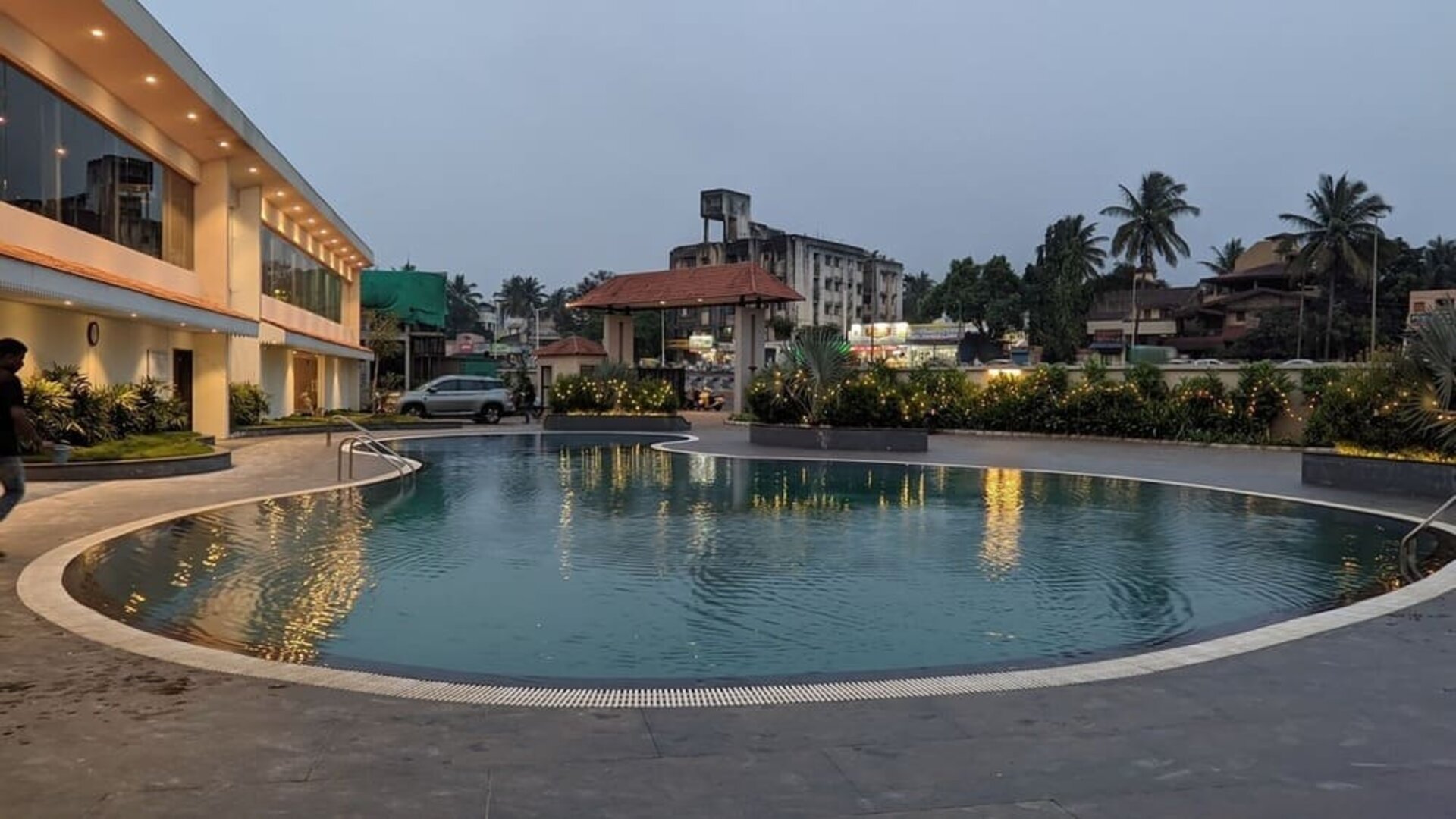 Relaxing outdoor pool at Mayur Belgaum Presidency Hotel & Spa.