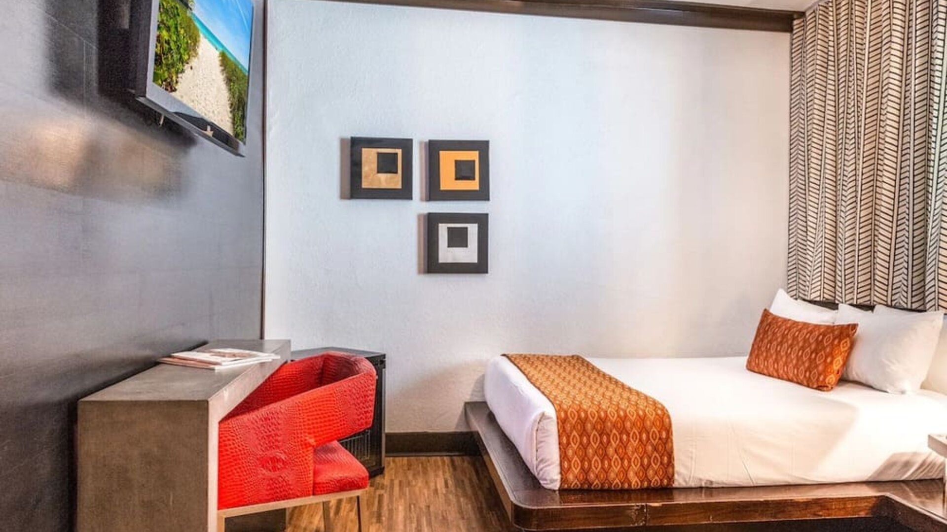 Delux king room with TV at Hotel Chelsea, A South Beach Group Hotel.