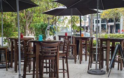 Hotel terrace with seating area at Hotel Chelsea, A South Beach Group Hotel.