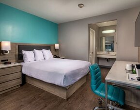 Day use room with work desk and private bathroom at Travelodge LAX By Wyndham.