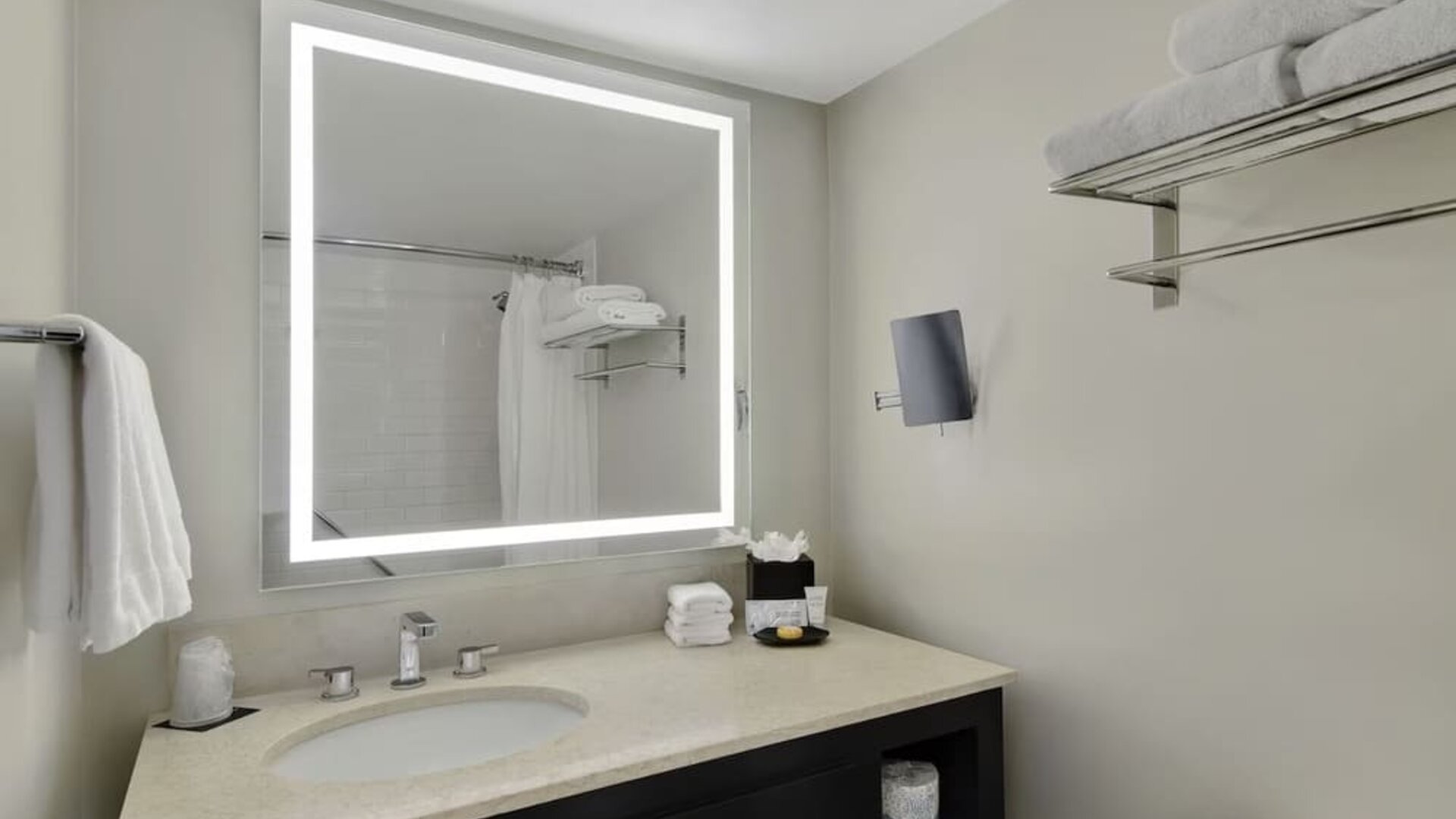 Private guest bathroom with shower and free toiletries at Hotel Tampa Riverwalk
