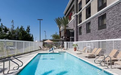 Refreshing outdoor pool at Hampton Inn Los Angeles-Orange County-Cypress.