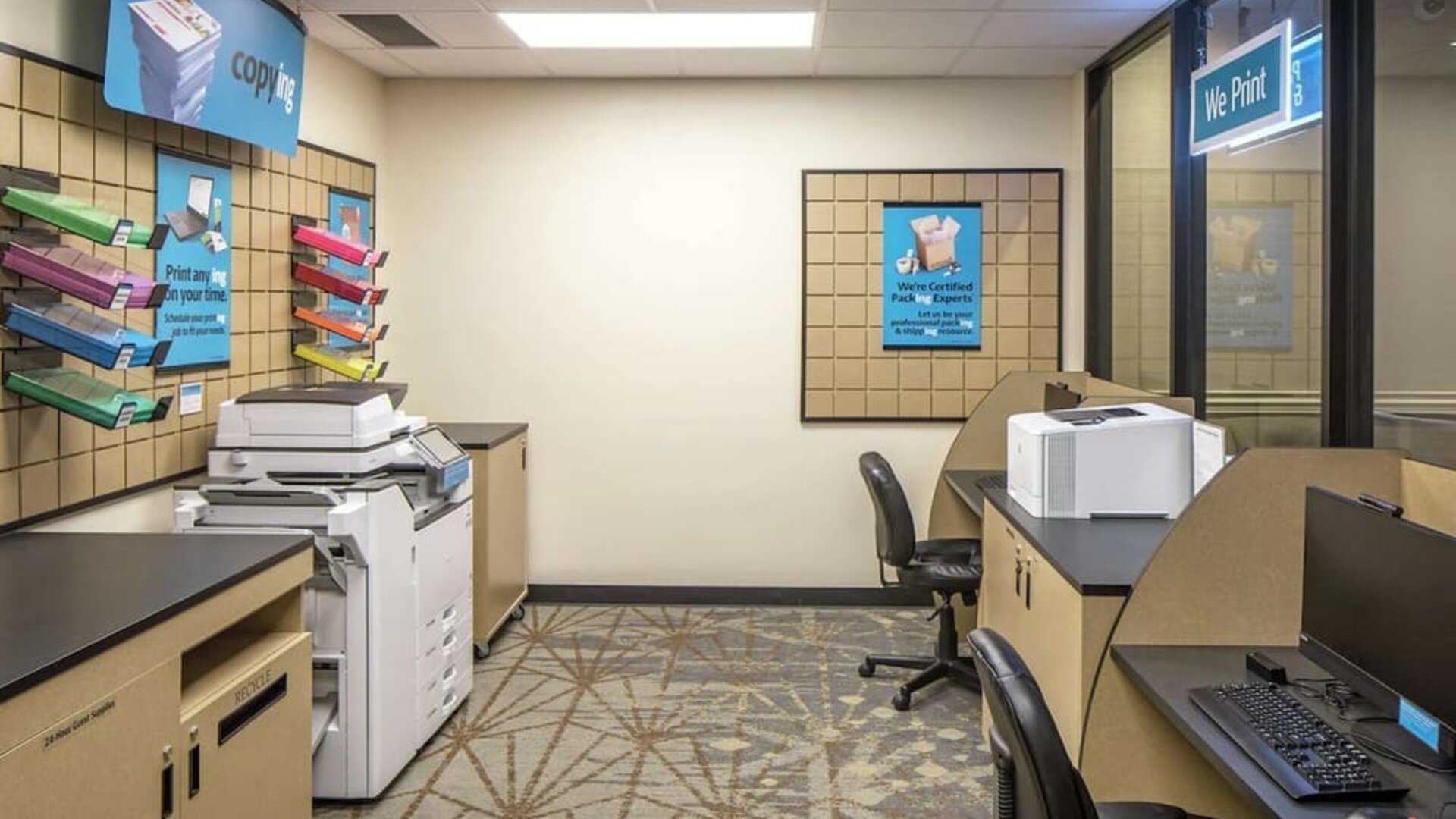 Business center with computers, printers and ergonomic chairs at Hilton Minneapolis.