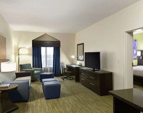Day use suite with living room and workspace at Hilton Garden Inn Houston NW/Willowbrook.