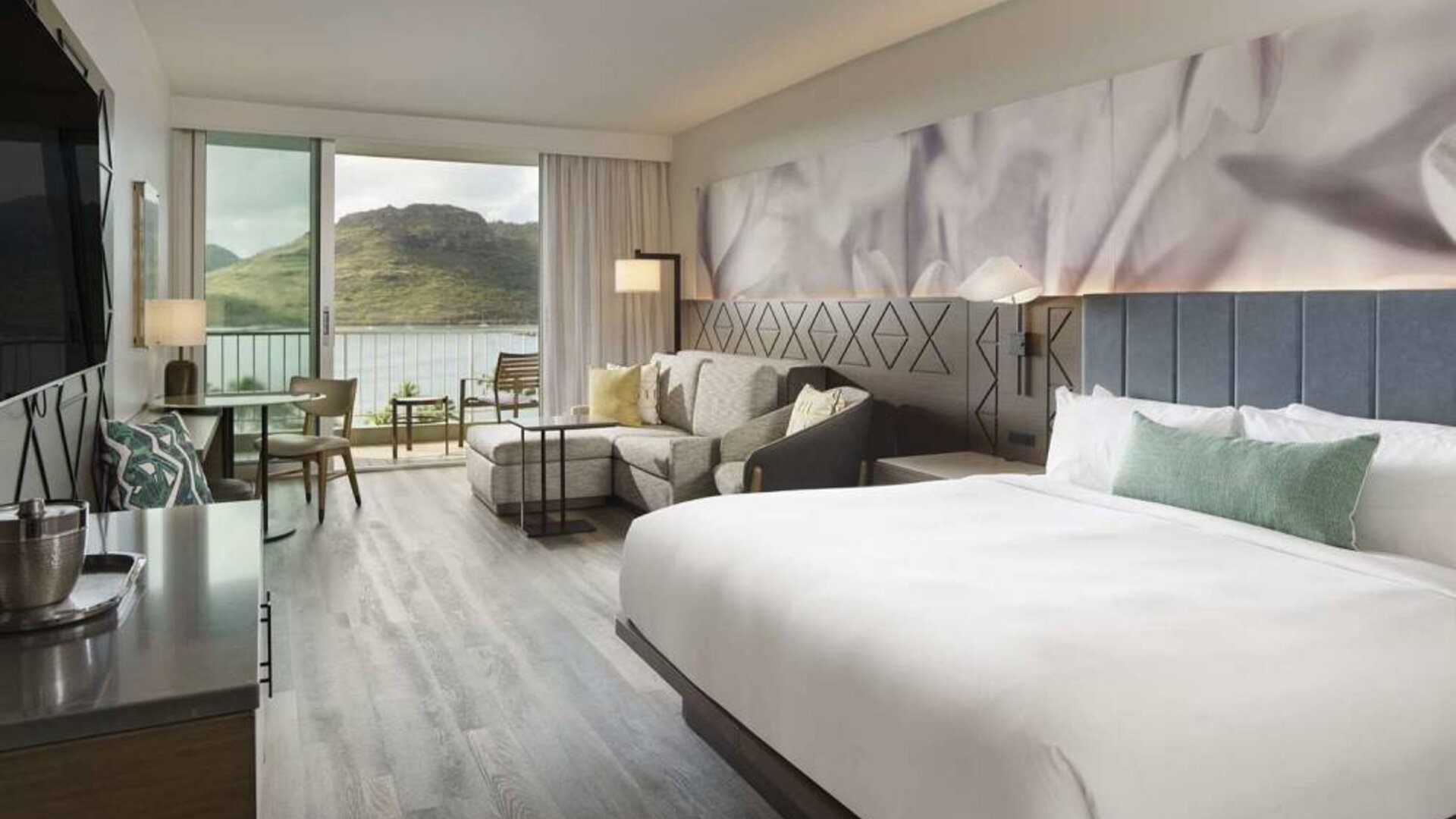 Royal Sonesta Kaua'i Resort Lihue double bed guest room, with sofa, balcony, and an ocean view.