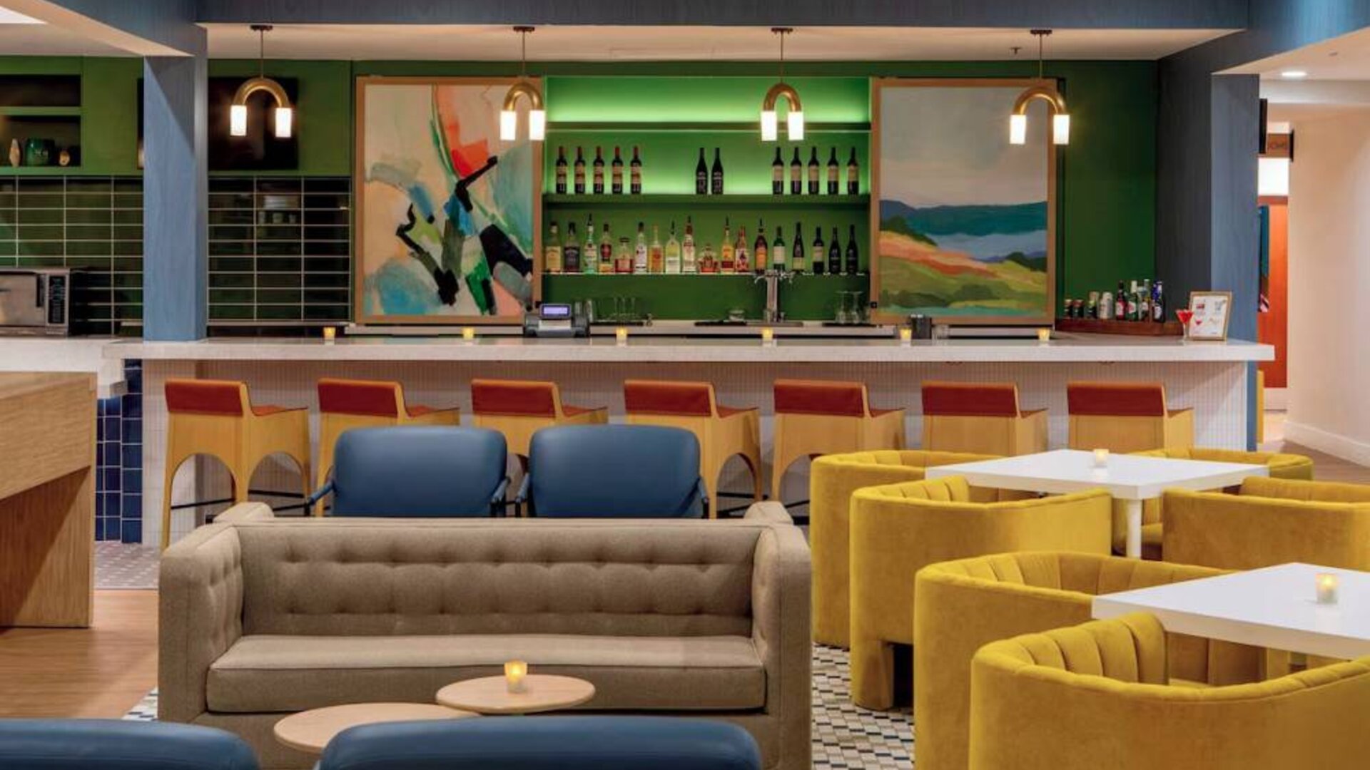 Sonesta Select Boston Foxborough Mansfield’s on-site restaurant The Commons has tall bar stool and table seating, plus a wide range of beverages at the bar.