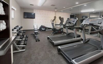 Fitness center available at Sonesta ES Suites Albuquerque.
