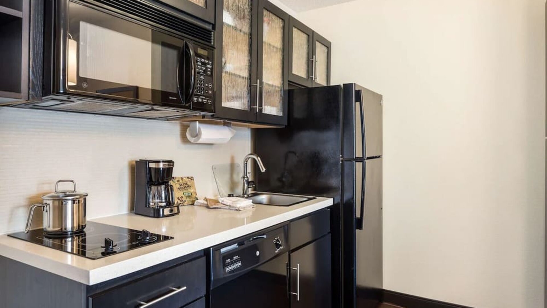 Kitchen available at Sonesta Simply Suites Detroit Warren.