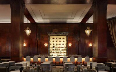 The Clift Royal Sonesta’s Redwood Room has decor inspired by art deco, and serves up small plates and cocktails for guests relaxing at the bar or at a small table.