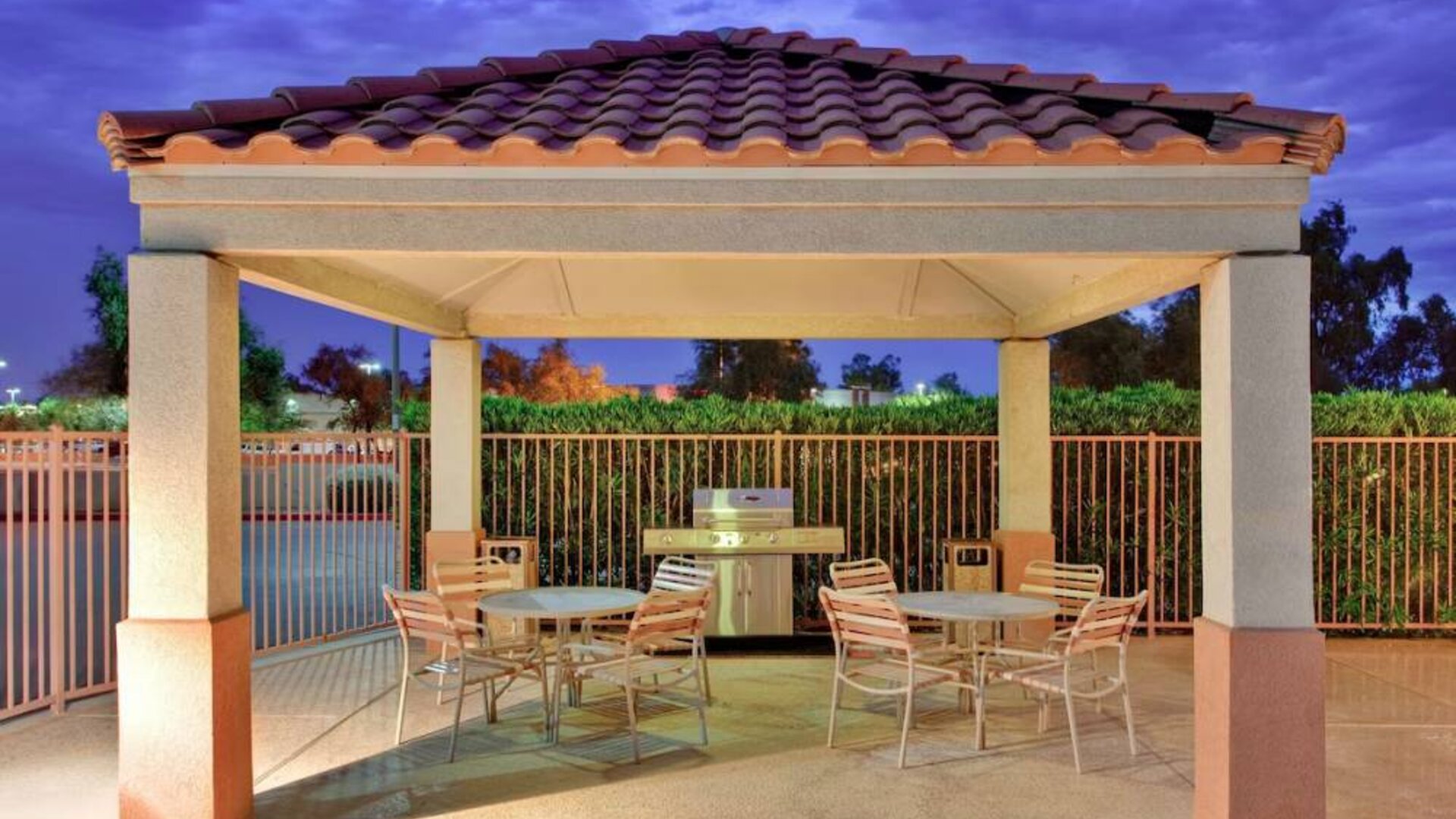 The gazebo at Sonesta Simply Suites Seattle Renton provides outdoors and under cover barbecue facilities, plus tables and chairs.
