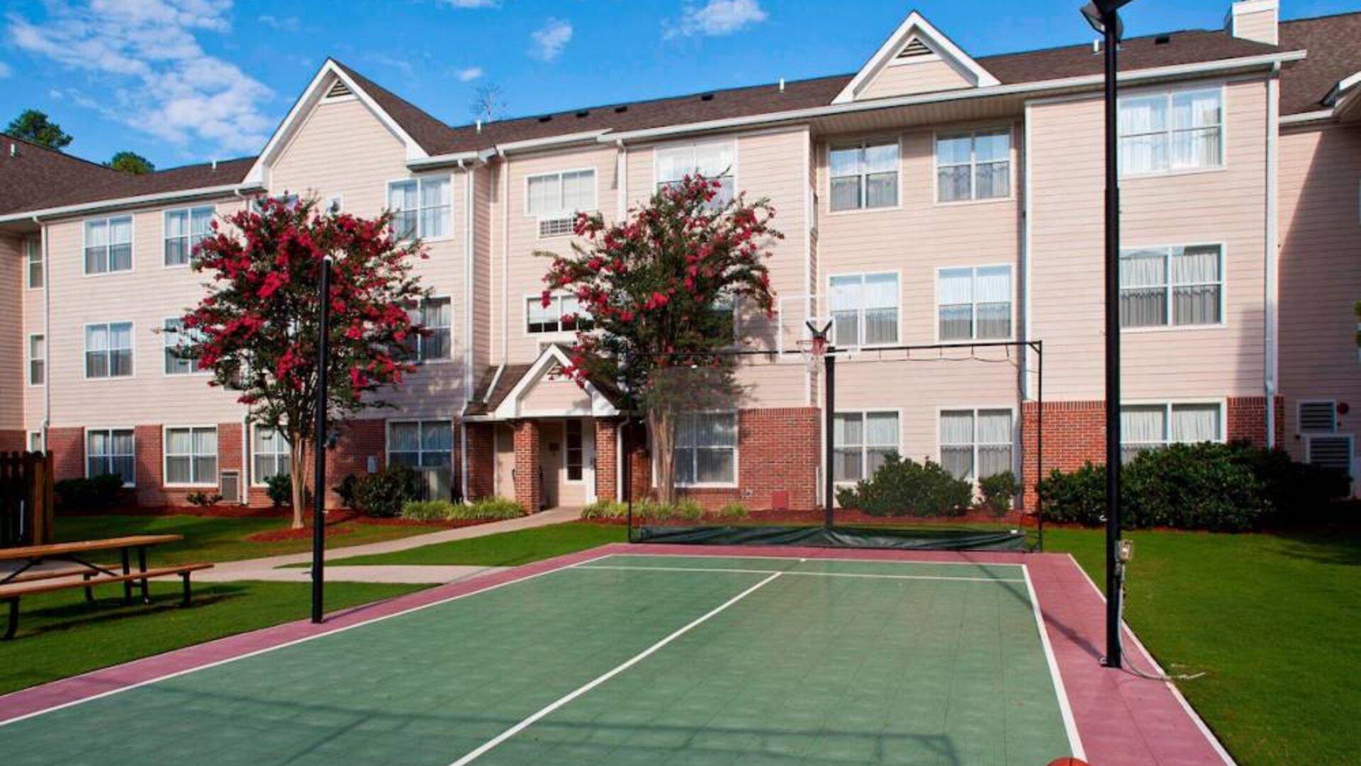 Sonesta ES Suites Birmingham Homewood’s outdoor sports court can be used for multiple activities, including tennis and basketball.