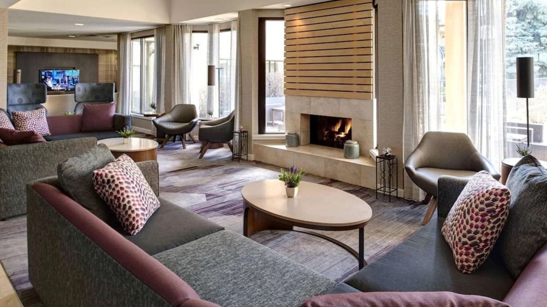 Fire place in lobby at Sonesta Select Milwaukee Brookfield.