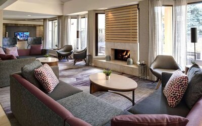 Fire place in lobby at Sonesta Select Milwaukee Brookfield.