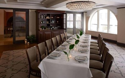 The Benjamin Royal Sonesta New York’s corner room offers white tablecloth dining in a chic setting, with plenty of natural light and a glittering chandelier.