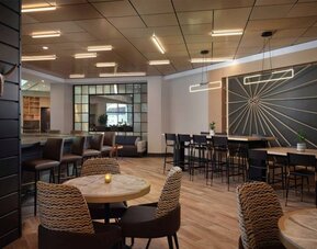 Haven Point Provisions & Spirits is the hotel restaurant and bar and serves up on-site dining, with a mix of regular and tall stool seating, and a hard floor.