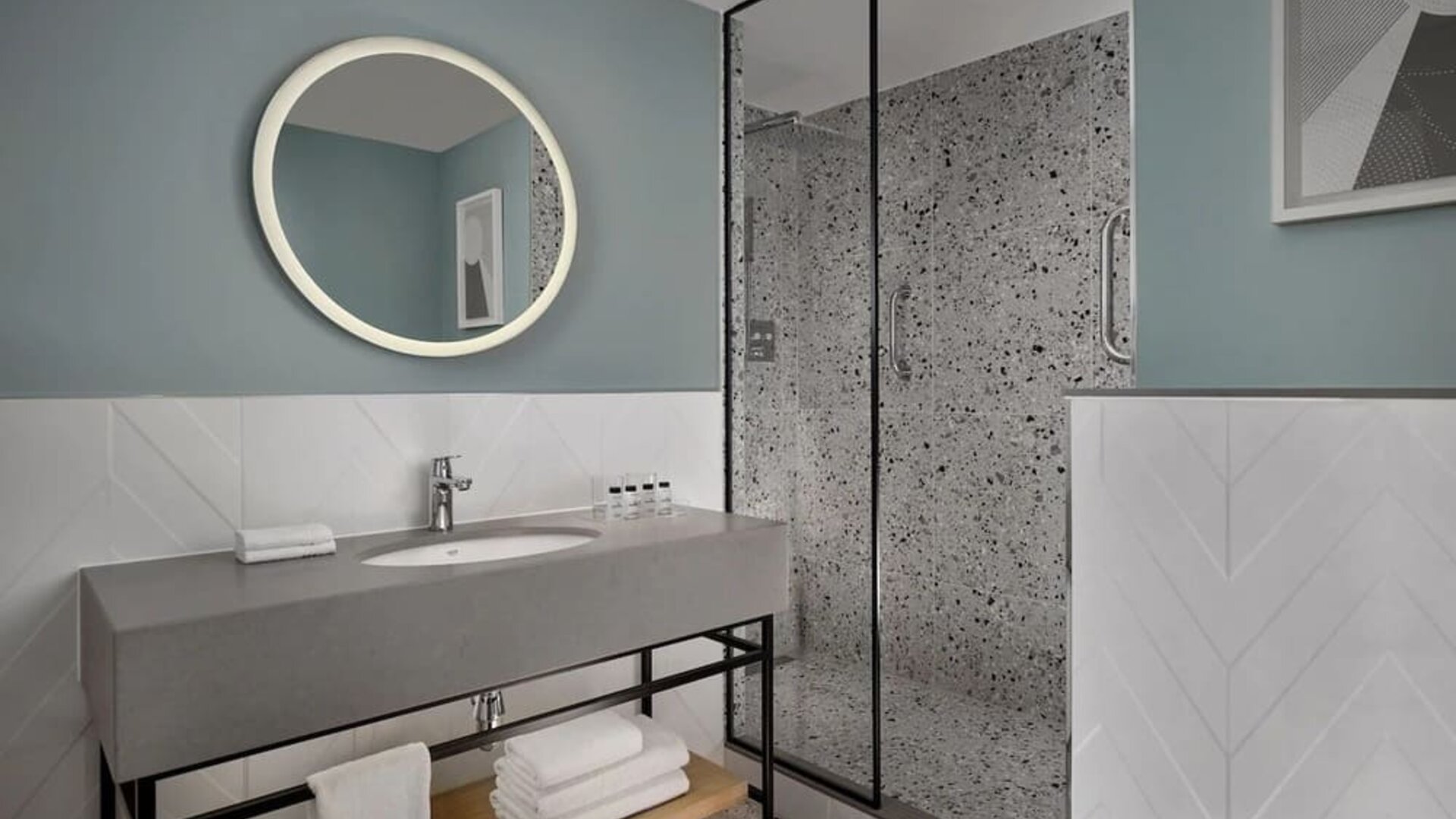 Guest bathroom with shower at Sheraton Amsterdam Airport Hotel And Conference Center.