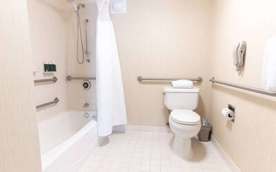 Sonesta ES Suites San Antonio Downtown Alamo Plaza guest bathroom, with shower-equipped bath, and a lavatory.