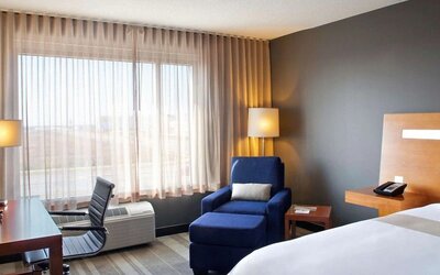 Delux king room with natural light at Novotel Toronto Vaughan Centre.